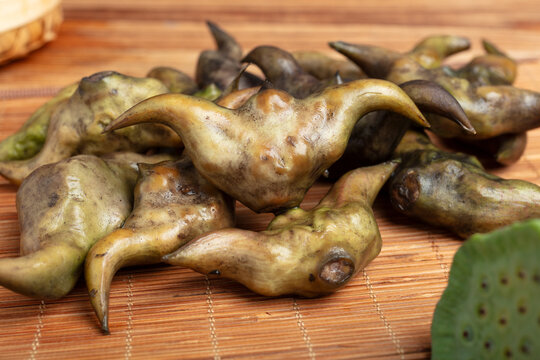 Fresh Water Caltrop Nuts on a Woven Mat
