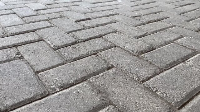 Close up of rough outdoor paving bricks texture with clean joints