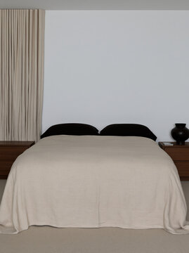 Peaceful bedroom designed around restorative sleep with natural linen bedding and neutral decor creating calm retreat