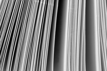 Fototapeta premium Abstract Stack of Paper Sheets and Pages Texture,Macro,Close-up abstract perspective view of stacked paper sheets and book pages showing rich lines, textures, and neutral tones, ideal for educational,