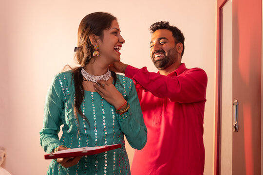 Couple sharing a joyful moment during a celebration