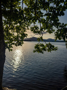 Sunset at the shore of Loch Lomond near Balmaha, Scotland.