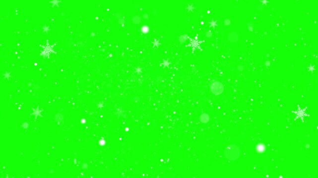 Sparkling star particles floating gently over a bright green screen background for video compositing and special effects.