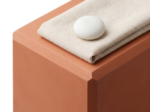 White soap bar on linen towel and terracotta podium-(Batangan sabun putih di atas handuk linen dan podium terakota)