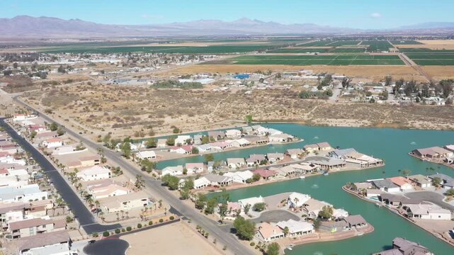 Aerial view of waterfront homes in a desert community