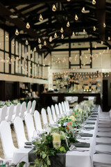 Naklejka premium Elegant long table set for wedding reception