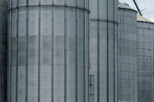 Textured metal exterior of industrial grain elevators