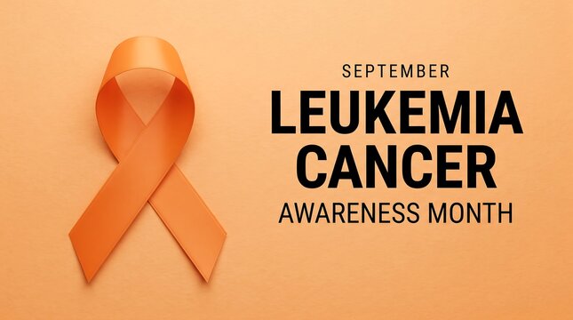 Orange awareness ribbon symbolizing leukemia cancer awareness month held in september against a matching solid orange background with bold black text