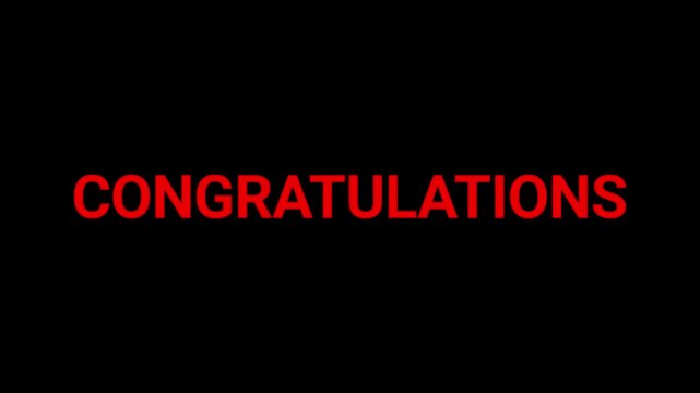 Congratulations text glows in bold red letters against a dark background to celebrate success and achievement in a professional setting.