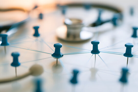 The stethoscope is paired with eye-catching pins, emphasizing the intricate referral and consultation network among general practitioners and specialists