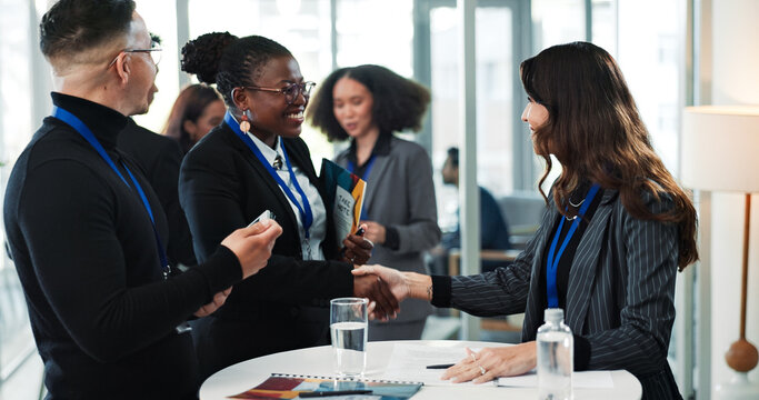 Business people, convention or shaking hands for greeting, meeting and introduction with smile. Seminar, happy group or handshake for welcome, partnership collaboration or workshop event with paper
