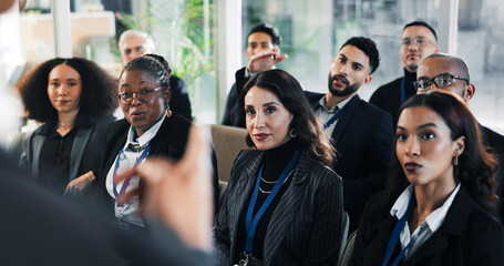 Obraz premium Business, training or people in office with attention, learning or presentation in budget review. Meeting, crowd or finance advisor with insight, target coaching or engagement in corporate literacy.