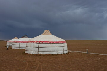 Yurt camp in Gobi desert before the storm, Mongolia © Vedrana