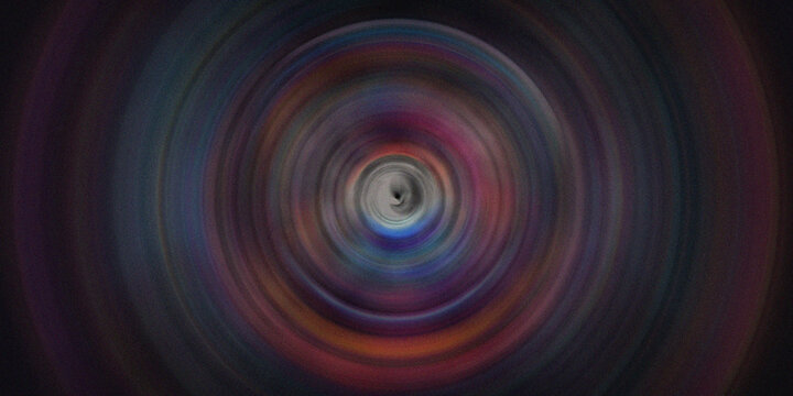Abstract colorful swirling tunnel effect creating a vibrant textured background.