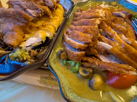 Freshly roasted Peking duck with mandarin sauce at the Chinese restaurant.