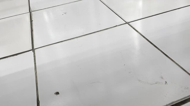 Abstract ceramic tile floor texture background video with black grout lines