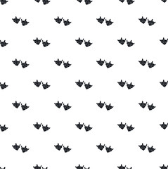 Fototapeta premium Duck footprints forming a seamless pattern on a white background