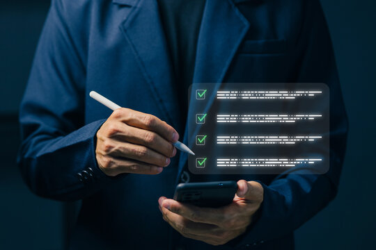 Business professional using smartphone and stylus with checklist interface, representing task management, online survey, compliance review, quality control, and mobile business workflow.