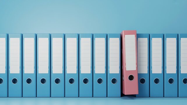 Organized office binders with colored folders arranged on a blue background