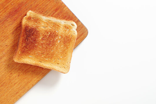 Crispy Toast on Wooden Board