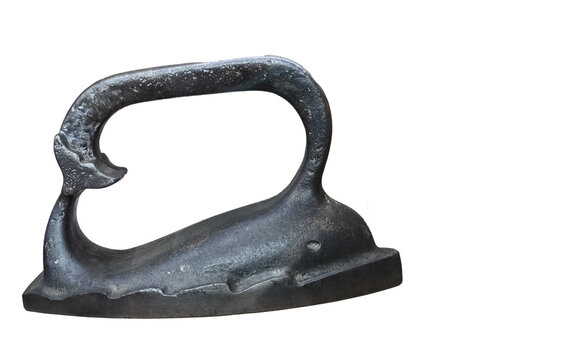 Close-up of a vintage cast-iron "Whale" iron, isolated on a white background.