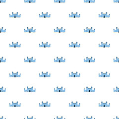 Fototapeta premium Blue fantasy castle icons repeating on a white background creating a playful pattern