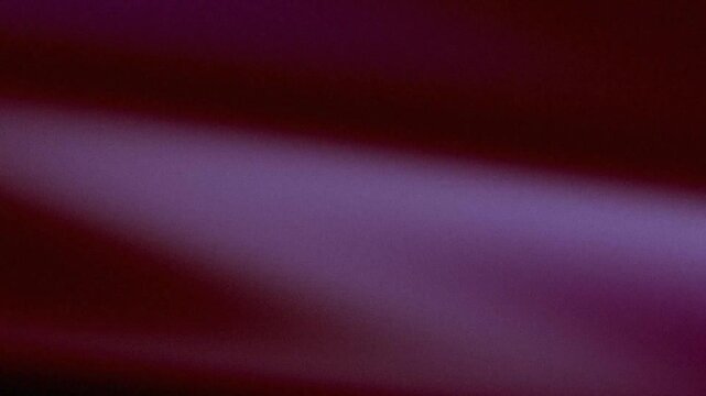 Moody purple gradient background with abstract light and grainy texture