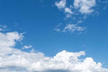 Fototapeta premium Summer morning blue sky with clouds, macro.