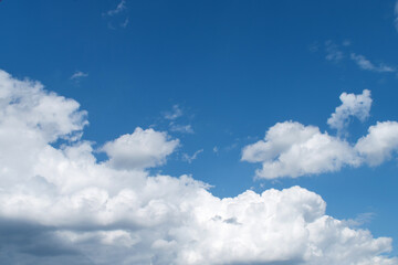 Obraz premium Summer morning blue sky with clouds, macro.