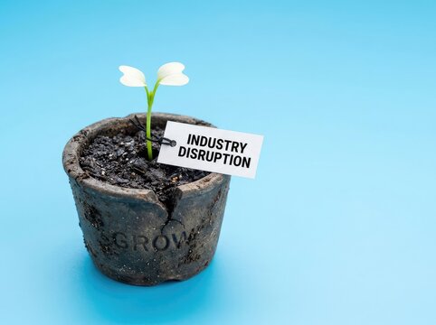 Green plant breaking a small pot with industry disruption tag ideal for business strategy symbolizing market innovation and radical change