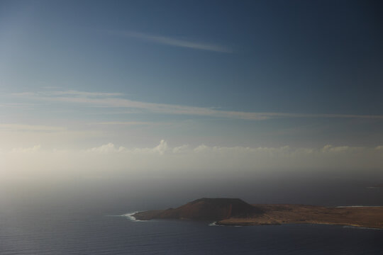 La Graciosa Volcanic Peninsula in Ocean Haze