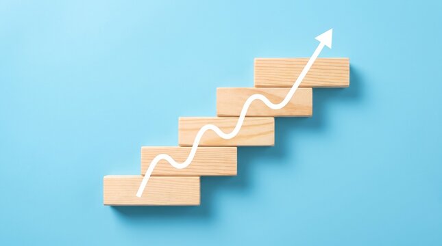 Wooden blocks arranged as a staircase with an upward wavy arrow symbolizing growth and progress.