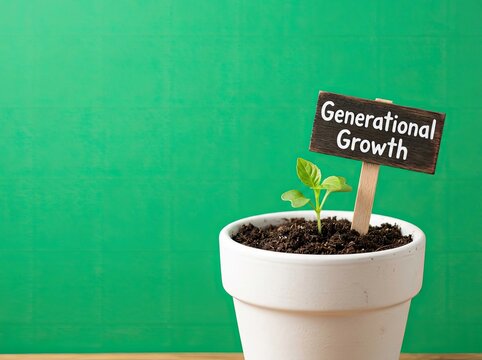 Green plant sprout growing in a pot with a wooden sign suitable for investment media symbolizing long term legacy and generational wealth