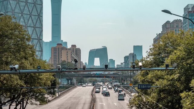 Beijing Central Business District street traffic with modern skyline, China in Beijing Central Business District, Beijing, China