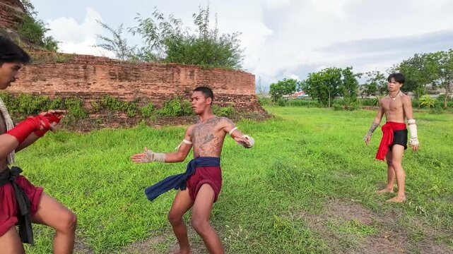 Traditional Muay Thai Fighters Sparring at Ayutthaya Historical Park