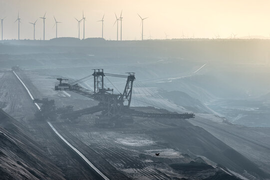 Germany, North Rhine-Westphalia, Grevenbroich, Garzweiler surface mine, Stacker and wind wheels in the background