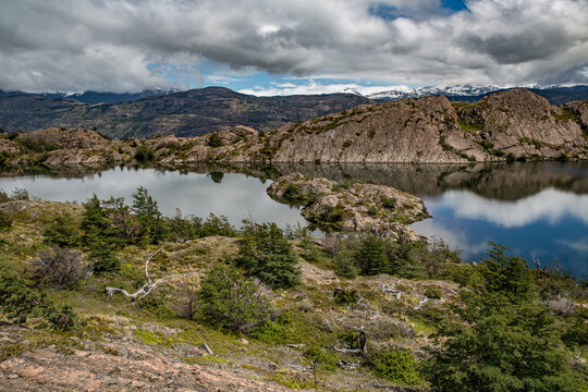 Scenic view of torres del paine national park with snow-capped mountains and blue lake in patagonia