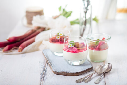 Glasses of Panna Cotta with roasted rhubarb