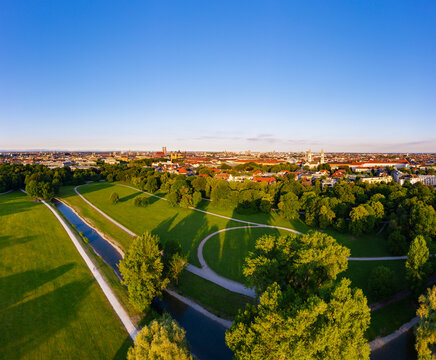 Germany, Bavaria, Munich, Aerial view of clear sky over Schwabinger Bach stream flowing through English Garden at dawn