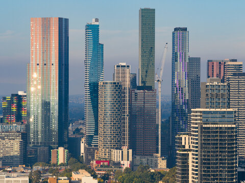 Aerial view of twilight settling over skyscrapers of a major city skyline