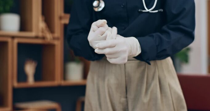 Doctor, hands and gloves in office for safety protocol, medical procedure and protection from germs. Healthcare worker, person and getting ready in clinic with PPE, hygiene rules and regulations.