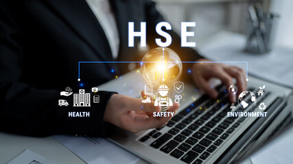 Health, Safety, and Environment Concept in Business, Professional Helping to Promote Safety...