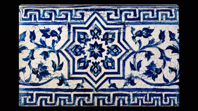 Moroccan Fes blue pottery ceramic macro with cobalt blue Islamic star arabesque geometric brushwork on white tin-glaze crackle surface on black background