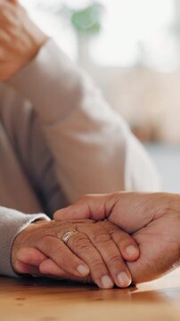 Holding hands, support and couple in home for comfort, love and bonding in marriage on weekend. Care, trust and man with woman in house for safety, connection or commitment in relationship together.