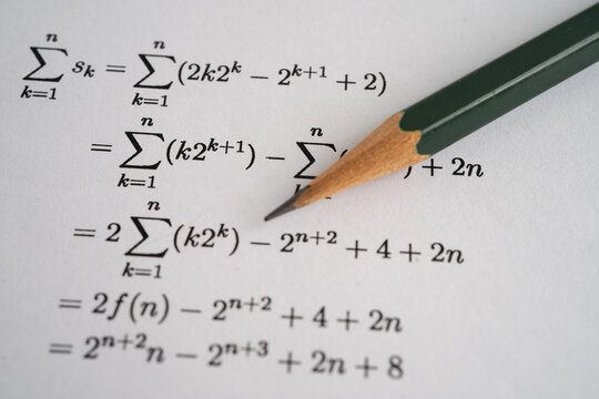 Pencil on mathematic formula exercise test paper in education school.