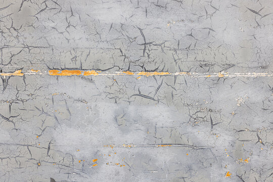 Weathered Cracked Grey Paint Texture with Orange Underlayer