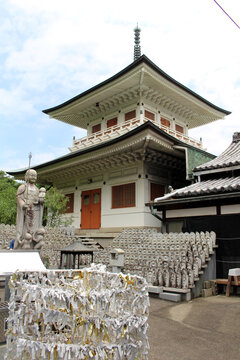 Two-Story White Pagoda and Jizo Statues at Sanuki Kokubunji Temple on Shikoku Henro Pilgrimage, Kagawa, Japan 2026