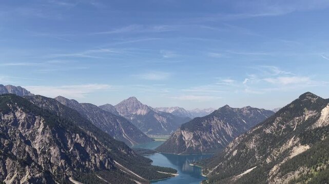 Lake Plansee within the Ammergau Alps in the Reutte District of Tyrol, Austria aerial landscape
