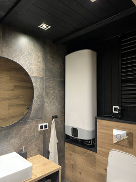 Residential electric water heater in modern home interior