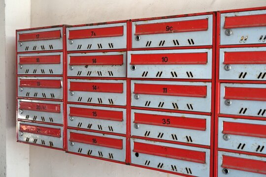 Mailboxes in common area of an apartment building in Lodz, Poland. Residential building lobby.